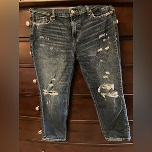 Mid-Rise Boyfriend jeans (distressed).